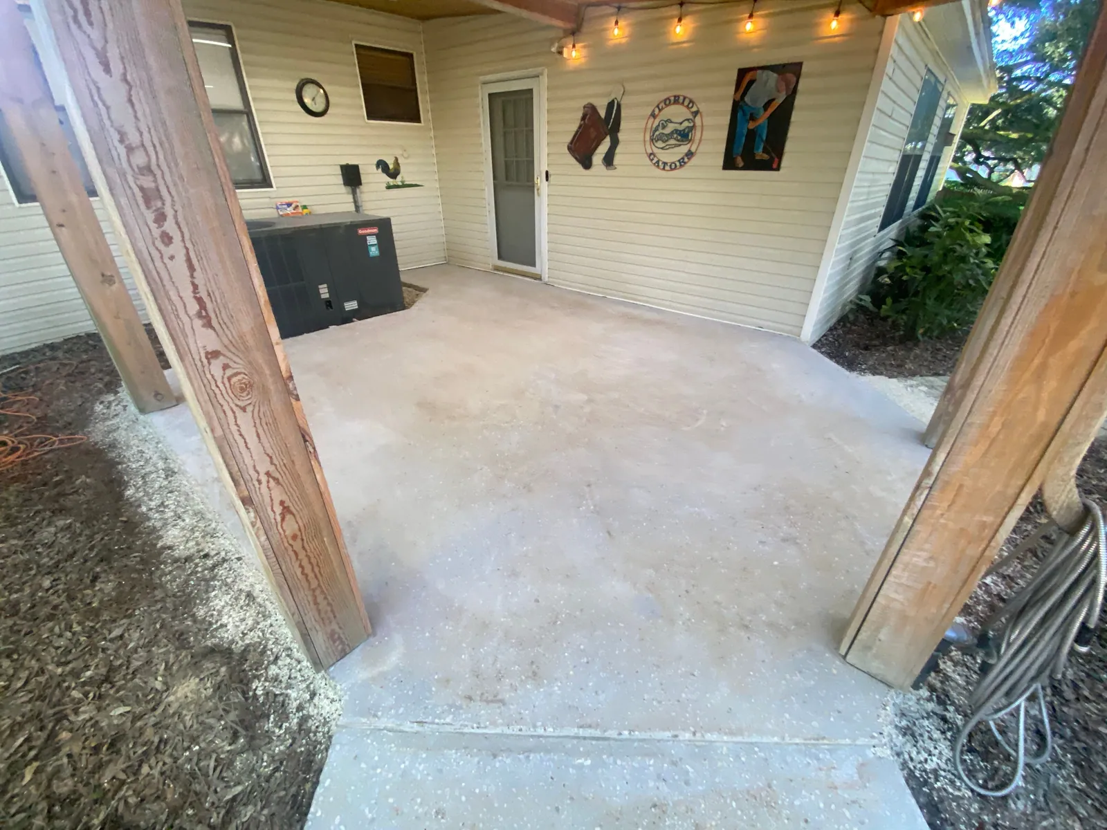 Pace patio before coating in Pace, FL